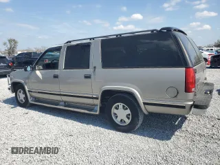 1999 GMC Suburban with VIN 1GKEC16R2XJ700510, listed as a Copart auction lot 45296135 with 189,004 mi miles and Clean Title. Bid and sale history available at carsss.com. Image 2.