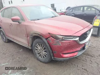 2017 Mazda CX-5 Touring with VIN JM3KFBCL9H0196693, listed as a IAAI auction lot 41136650 with 126,087 mi miles. Bid and sale history available at carsss.com. Image 6.