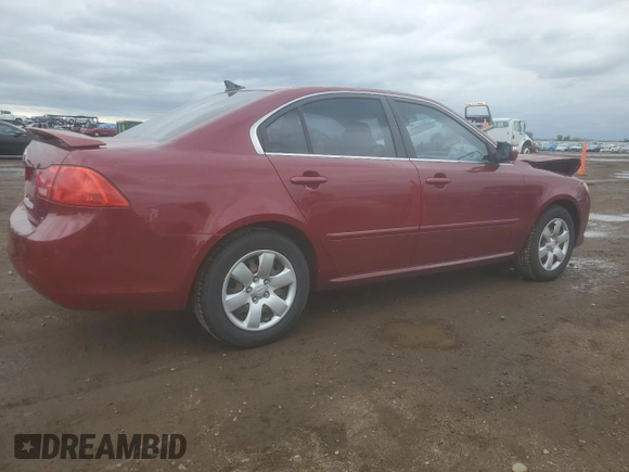 2009 Kia Optima LX z VIN KNAGE228395313765, wystawiony jako Copart lot #59707675 z przebiegiem 170 773 mil mil oraz Szkoda całkowita • Salvage title. Historia ofert i sprzedaży dostępna na DreamBid. Obrazek 3.