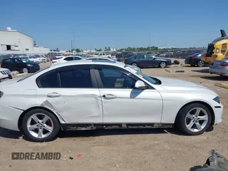 2012 BMW 3 Series 328i with VIN WBA3A5C51CF349987, listed as a IAAI auction lot 42013599 with 256,461 mi miles. Bid and sale history available at carsss.com. Image 13.