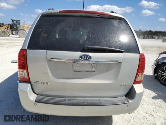 2012 Kia Sedona EX with VIN KNDMH4C72C6459882, listed as a Copart auction lot 77481744 with 136,947 mi miles and Salvage Title. Bid and sale history available at carsss.com. Image 6.
