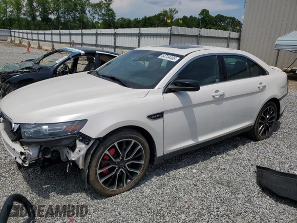 2018 Ford Taurus SHO z VIN 1FAHP2KT6JG107120, wystawiony jako Copart lot #54734405 z przebiegiem 55 800 mil mil oraz Czysty tytuł • Clean title. Historia ofert i sprzedaży dostępna na DreamBid. Obrazek 1.