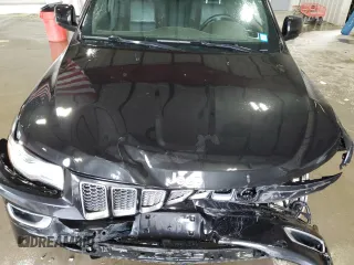 2015 Jeep Grand Cherokee Summit with VIN 1C4RJFJG0FC685241, listed as a Copart auction lot 56122505 with 112,516 mi miles and Salvage title. Bid and sale history available at DreamBid. Image 12.