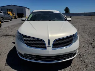 2013 Lincoln MKS с VIN 1LNHL9EK8DG610553, выставлен на аукционе Copart как лот 59160125 с пробегом 128 846 миль миль и Списание • Salvage title. История ставок и продаж доступна на DreamBid. Изображение 5.