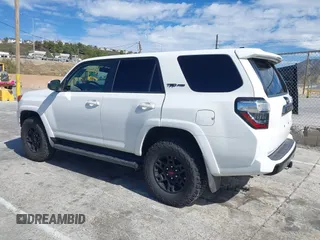 2018 Toyota 4Runner SR5 with VIN JTEBU5JRXJ5484802, listed as a IAAI auction lot 41609448 with 71,085 mi miles and . Bid and sale history available at DreamBid. Image 3.