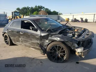 2012 Chrysler 300 with VIN 2C3CCAET3CH256182, listed as a Copart auction lot 52744035 with 153,490 mi miles and Salvage Title. Bid and sale history available at carsss.com. Image 4.