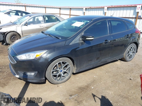 2015 Ford Focus SE with VIN 1FADP3K26FL320689, listed as a IAAI auction lot 42160904 with 95,136 mi miles and . Bid and sale history available at DreamBid. Image 2.