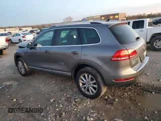 2013 Volkswagen Touareg Lux with VIN WVGEF9BP9DD008935, listed as a Copart auction lot 79859394 with Not Provided miles and Salvage Title. Bid and sale history available at DreamBid. Image 2.