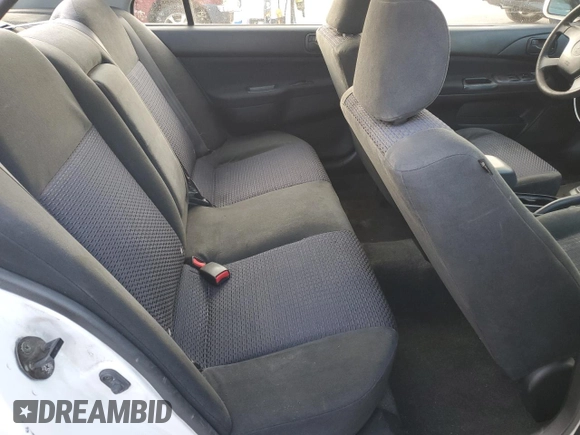 2002 Mitsubishi Lancer LS with VIN JA3AJ36E02U064779, listed as a Copart auction lot 86749184 with 127,343 mi miles and Salvage Title. Bid and sale history available at carsss.com. Image 10.