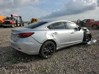 2016 Mazda 6 i Grand Touring с VIN JM1GJ1W53G1434499, выставлен на аукционе Copart как лот 54739745 с пробегом Не указан миль и Списание • Salvage title. История ставок и продаж доступна на DreamBid. Изображение 3.