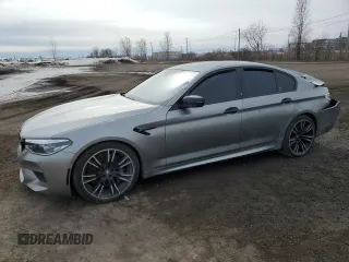 2020 BMW M5 z VIN WBSJF0C09LCE72758, wystawiony jako Copart lot #51132475 z przebiegiem Nie podano mil oraz Szkoda całkowita • Salvage title. Historia ofert i sprzedaży dostępna na DreamBid. Obrazek 1.