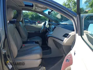 2011 Toyota Sienna XLE AAS with VIN 5TDYK3DC4BS136568, listed as a IAAI auction lot 42639252 with 239,020 mi miles and . Bid and sale history available at DreamBid. Image 5.