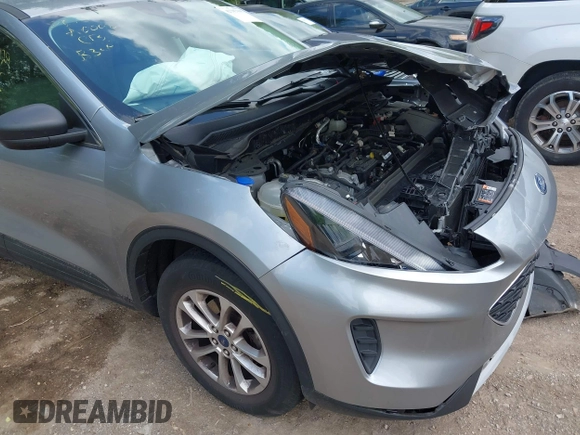 2022 Ford Escape SE z VIN 1FMCU9G62NUB34729, wystawiony jako IAAI lot #42202065 z przebiegiem 22 706 mil mil oraz . Historia ofert i sprzedaży dostępna na DreamBid. Obrazek 6.