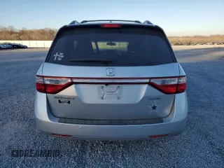 2012 Honda Odyssey Touring with VIN 5FNRL5H9XCB027758, listed as a Copart auction lot 86058504 with 164,860 mi miles and Salvage Title. Bid and sale history available at DreamBid. Image 6.