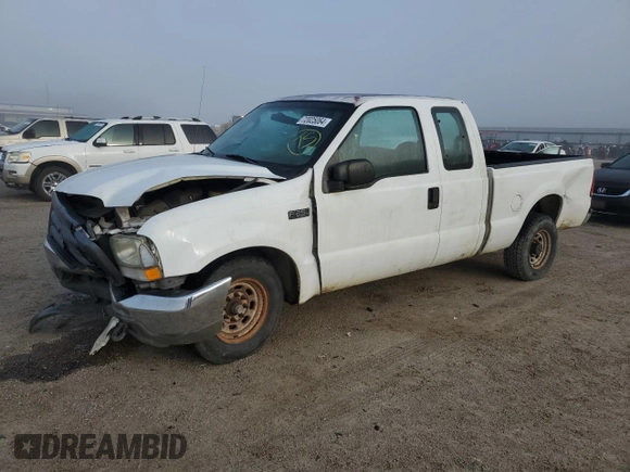 2004 Ford Super Duty F-250 XL with VIN 1FTNX20L34EB74712, listed as a Copart auction lot 72025064 with 141,857 mi miles and Salvage Title. Bid and sale history available at carsss.com. Image 1.