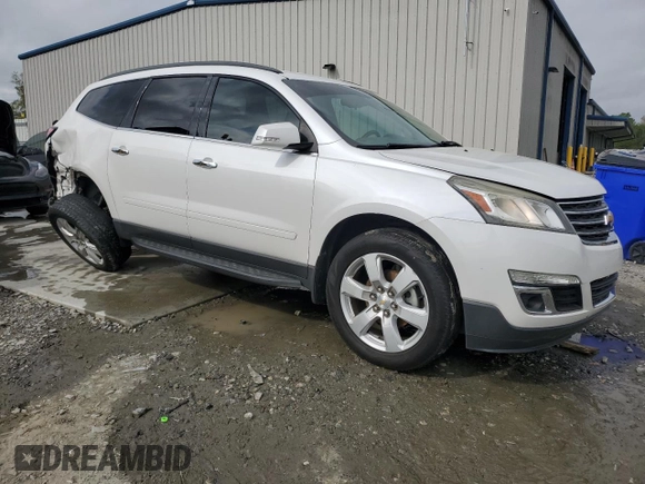 2016 Chevrolet Traverse LT with VIN 1GNKRGKD0GJ118570, listed as a Copart auction lot 50697755 with 121,181 mi miles and Salvage title. Bid and sale history available at DreamBid. Image 4.