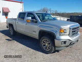 2015 GMC Sierra 1500 SLT with VIN 3GTU2VEJ8FG430051, listed as a IAAI auction lot 41208698 with 191,699 mi miles and . Bid and sale history available at DreamBid. Image 1.