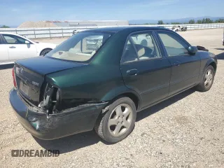 2002 Mazda Protege DX with VIN JM1BJ225121567924, listed as a Copart auction lot 54847545 with 93,653 mi miles and Salvage Title. Bid and sale history available at DreamBid. Image 3.