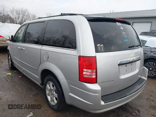 2010 Chrysler Town & Country Touring with VIN 2A4RR5D14AR293299, listed as a IAAI auction lot 41184584 with 245,928 mi miles. Bid and sale history available at carsss.com. Image 3.