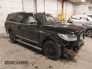2021 Lincoln Navigator Reserve with VIN 5LMJJ2LT3MEL11572, listed as a IAAI auction lot 41615607 with 94,792 mi miles. Bid and sale history available at carsss.com. Image 1.
