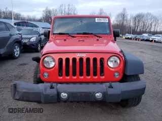 2015 Jeep Wrangler Willys Wheeler with VIN 1C4AJWAG9FL543998, listed as a Copart auction lot 88947025 with 142,433 mi miles and Salvage title. Bid and sale history available at DreamBid. Image 5.