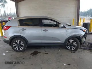 2013 Kia Sportage SX with VIN KNDPCCA69D7529910, listed as a IAAI auction lot 41414560 with 101,769 mi miles and . Bid and sale history available at carsss.com. Image 14.