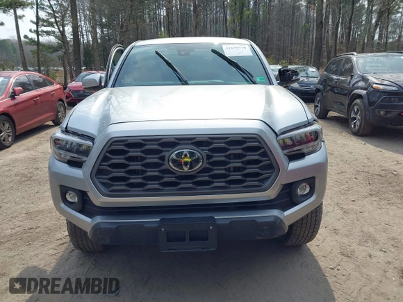2022 Toyota Tacoma SR with VIN 3TMCZ5ANXNM497511, listed as a IAAI auction lot 41670710 with 26,277 mi miles and . Bid and sale history available at DreamBid. Image 12.