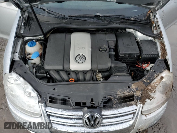 2009 Volkswagen Jetta SE z VIN 3VWRZ71K89M062050, wystawiony jako Copart lot #83973194 z przebiegiem 48 996 mil mil oraz Szkoda całkowita • Salvage title. Historia ofert i sprzedaży dostępna na DreamBid. Obrazek 13.