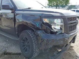2016 Chevrolet Suburban LT z VIN 1GNSKHKC8GR223442, wystawiony jako IAAI lot #42166983 z przebiegiem 204 827 mil mil oraz . Historia ofert i sprzedaży dostępna na DreamBid. Obrazek 6.
