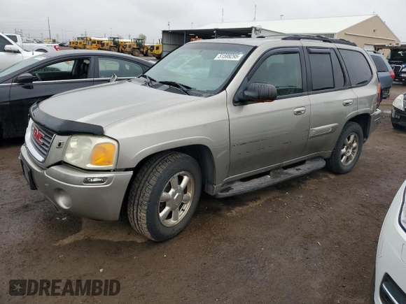 2002 GMC Envoy SLT with VIN 1GKDT13S222296226, listed as a Copart auction lot 51599295 with 148,653 mi miles and Salvage Title. Bid and sale history available at carsss.com. Image 1.