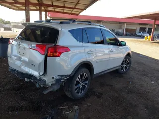 2015 Toyota RAV4 Limited with VIN 2T3DFREV4FW340913, listed as a IAAI auction lot 41807057 with 182,754 mi miles. Bid and sale history available at carsss.com. Image 4.