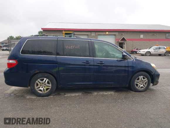 2005 Honda Odyssey EX-L with VIN 5FNRL38725B001662, listed as a IAAI auction lot 42693301 with 161,114 mi miles and . Bid and sale history available at DreamBid. Image 14.