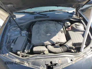 2014 Chevrolet Camaro LS z VIN 2G1FA1E35E9255913, wystawiony jako Copart lot #56976695 z przebiegiem 231 070 mil mil oraz Szkoda całkowita • Salvage title. Historia ofert i sprzedaży dostępna na DreamBid. Obrazek 11.