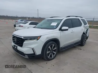2023 Honda Pilot Elite with VIN 5FNYG1H88PB000855, listed as a IAAI auction lot 41574247 with 47,011 mi miles. Bid and sale history available at carsss.com. Image 2.
