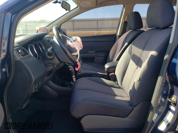 2007 Nissan Versa 1.8 SL with VIN 3N1BC11E57L407117, listed as a Copart auction lot 77336884 with 193,869 mi miles and Salvage Title. Bid and sale history available at carsss.com. Image 7.