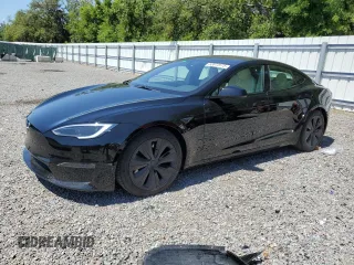 2022 Tesla Model S with VIN 5YJSA1E54NF487387, listed as a Copart auction lot 52072575 with 24,946 mi miles and Salvage Title. Bid and sale history available at DreamBid. Image 1.
