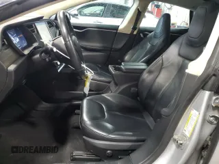2014 Tesla Model S 60 with VIN 5YJSA1H15EFP51239, listed as a Copart auction lot 59214485 with 153,554 mi miles and Salvage title. Bid and sale history available at DreamBid. Image 7.