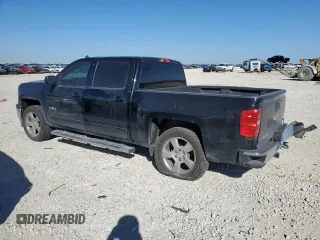 2015 Chevrolet Silverado 1500 LT with VIN 3GCPCREC0FG421086, listed as a Copart auction lot 48220245 with 153,566 mi miles and Salvage Title. Bid and sale history available at DreamBid. Image 2.