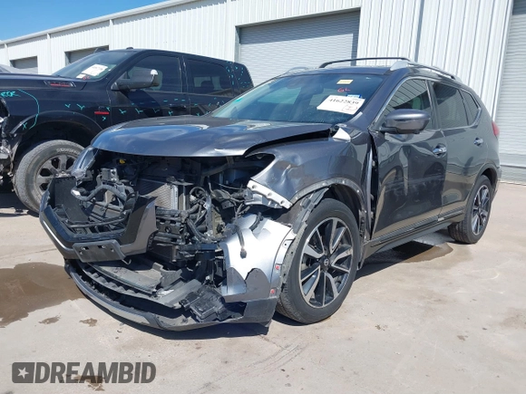2017 Nissan Rogue SL z VIN 5N1AT2MT8HC749372, wystawiony jako IAAI lot #41622839 z przebiegiem 90 638 mil mil oraz . Historia ofert i sprzedaży dostępna na DreamBid. Obrazek 20.