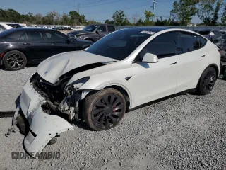 2020 Tesla Model Y Long Range z VIN 5YJYGDEF3LF043238, wystawiony jako Copart lot #52452955 z przebiegiem 69 757 mil mil oraz Szkoda całkowita • Salvage title. Historia ofert i sprzedaży dostępna na DreamBid. Obrazek 1.