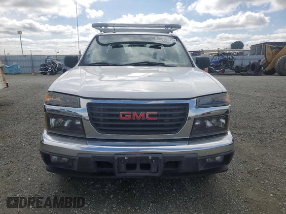 2012 GMC Canyon z VIN 1GTE5MFE6C8169267, wystawiony jako Copart lot #50096415 z przebiegiem 192 546 mil mil oraz Czysty tytuł • Clean title. Historia ofert i sprzedaży dostępna na DreamBid. Obrazek 5.