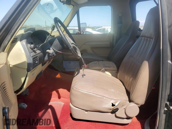 1993 Ford Bronco Custom with VIN 1FMEU15H0PLA22387, listed as a Copart auction lot 65433825 with Not provided miles and Clean title. Bid and sale history available at DreamBid. Image 7.