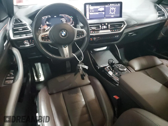 2023 BMW X4 xDrive30i with VIN 5UX33DT07P9P12954, listed as a Copart auction lot 42596275 with 27,590 mi miles and Salvage Title. Bid and sale history available at carsss.com. Image 8.