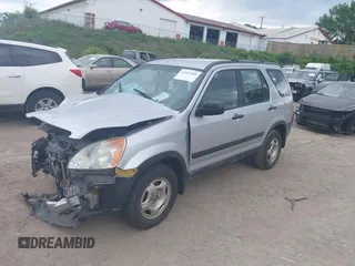 2002 Honda CR-V LX z VIN JHLRD78562C081322, wystawiony jako IAAI lot #42452985 z przebiegiem 193 011 mil mil oraz . Historia ofert i sprzedaży dostępna na DreamBid. Obrazek 2.