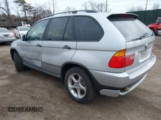 2001 BMW X5 3.0i with VIN WBAFA53571LM67411, listed as a IAAI auction lot 41727600 with 999,999 mi miles. Bid and sale history available at carsss.com. Image 3.