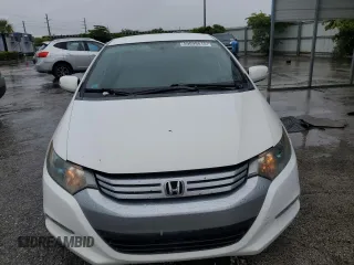 2011 Honda Insight EX z VIN JHMZE2H79BS009016, wystawiony jako Copart lot #59098615 z przebiegiem 136 715 mil mil oraz Szkoda całkowita • Salvage title. Historia ofert i sprzedaży dostępna na DreamBid. Obrazek 5.