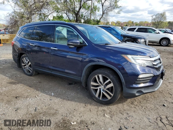 2017 Honda Pilot Touring with VIN 5FNYF6H94HB048329, listed as a Copart auction lot 53202735 with 140,453 mi miles and Salvage Title. Bid and sale history available at carsss.com. Image 4.