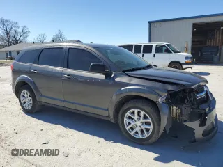2015 Dodge Journey American Value with VIN 3C4PDCAB2FT538201, listed as a Copart auction lot 47058615 with 135,280 mi miles and Salvage Title. Bid and sale history available at DreamBid. Image 4.