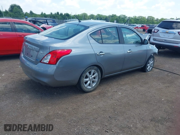 2012 Nissan Versa SV with VIN 3N1CN7APXCL812936, listed as a IAAI auction lot 42533280 with 78,071 mi miles and . Bid and sale history available at DreamBid. Image 4.