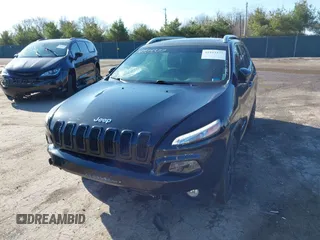 2016 Jeep Cherokee 75th Anniversary with VIN 1C4PJLCB5GW107918, listed as a IAAI auction lot 41923377 with 165,619 mi miles and . Bid and sale history available at DreamBid. Image 17.